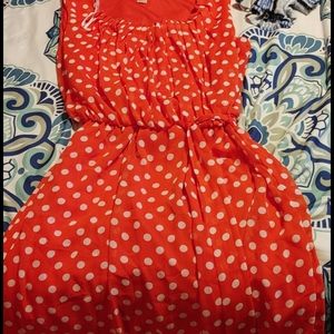 Red polka dot knee length dress